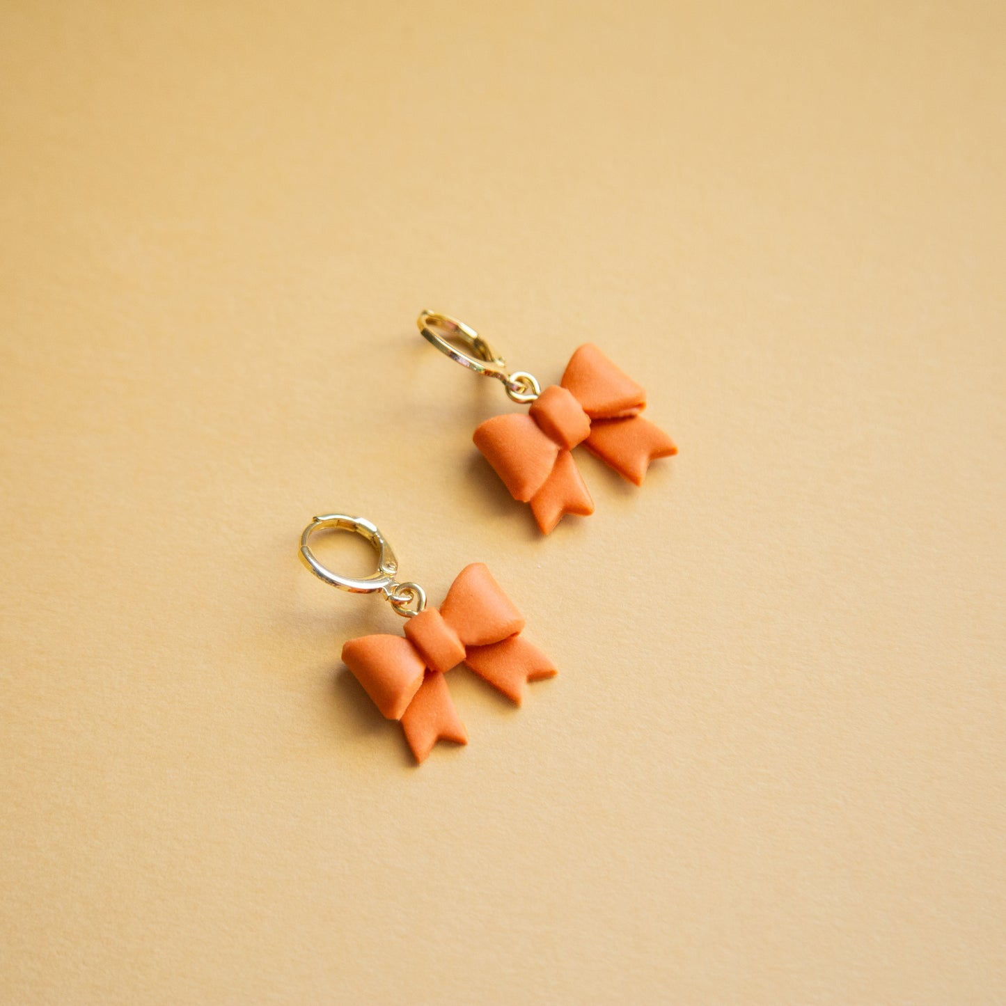 Bow Huggie Earrings
