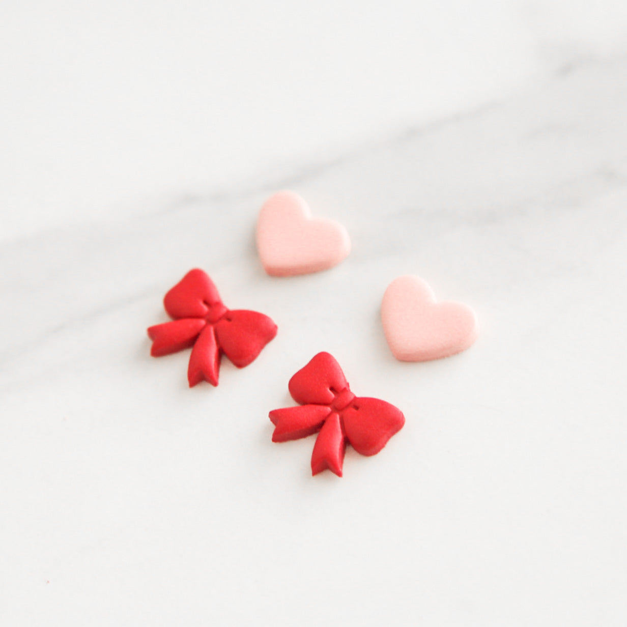 Bow and Heart Stud Set