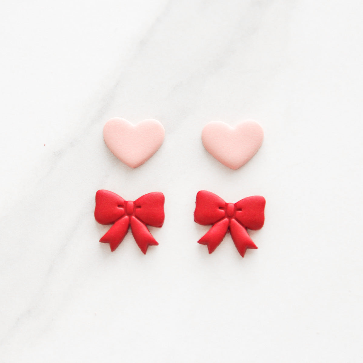 Bow and Heart Stud Set